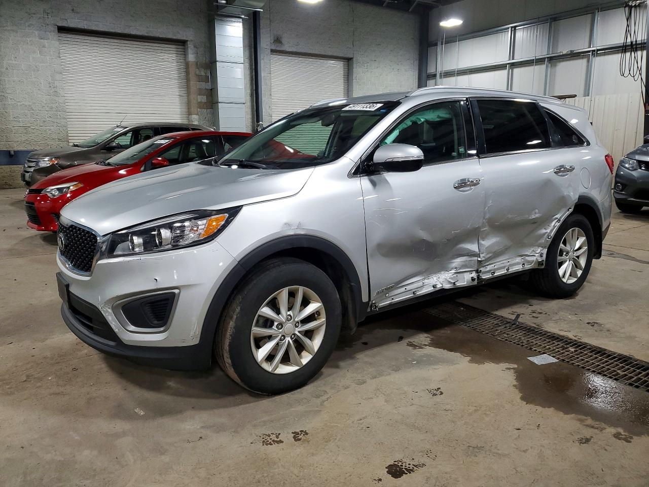 2016 Kia Sorento LX, VIN 5XYPGDA57GG109555 — Side