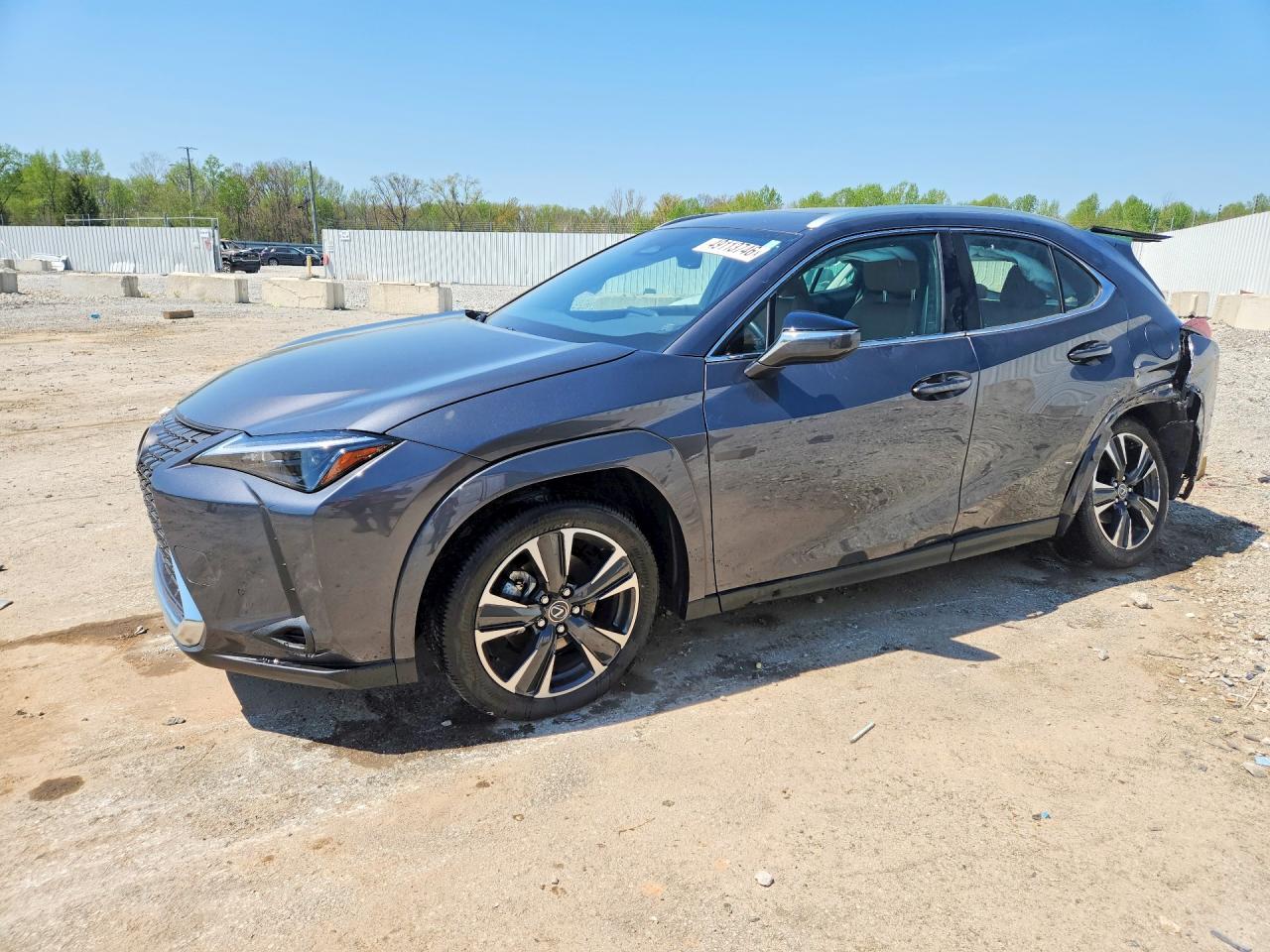2025 Lexus UX 300h Premium, VIN JTHUCJDH0S2011309 — Зад
