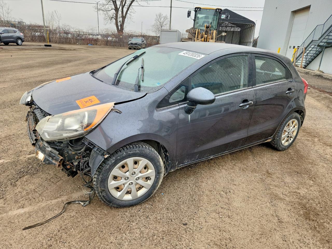 2013 Kia Rio LX, VIN KNADM5A34D6789099 — Side