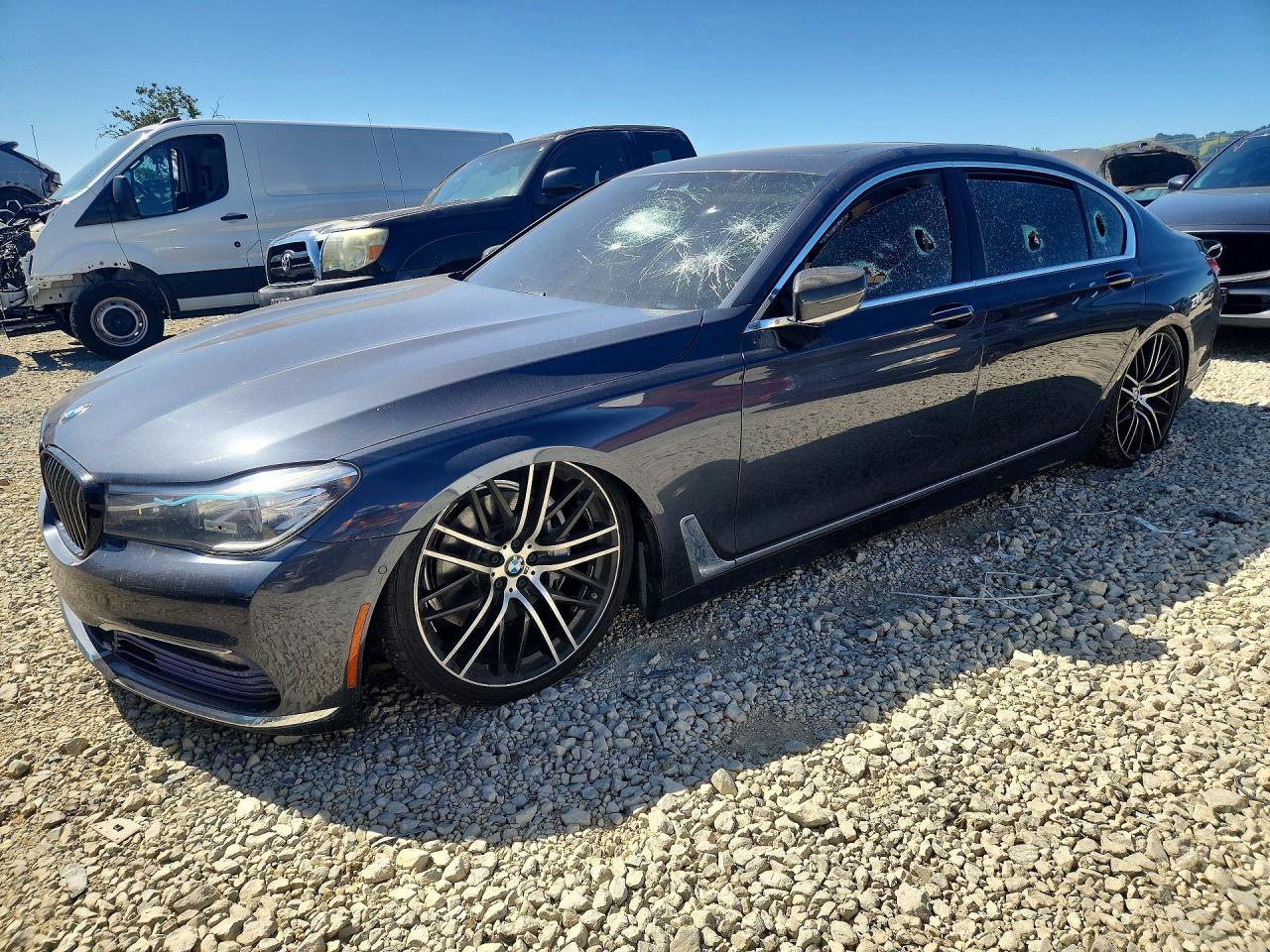 2016 BMW 7 Series 740i, VIN WBA7E2C57GG714550 — Vandalism