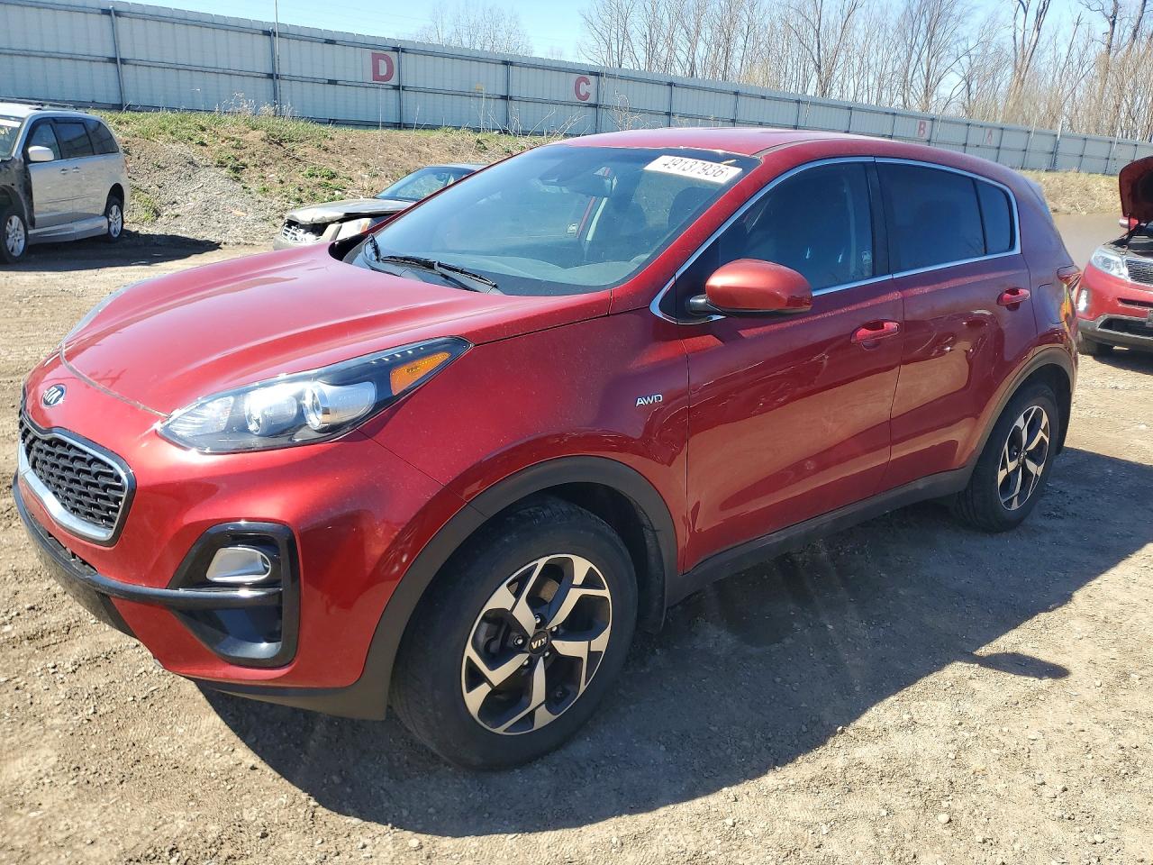 2021 Kia Sportage LX, VIN KNDPMCAC6M7942709 — Бок