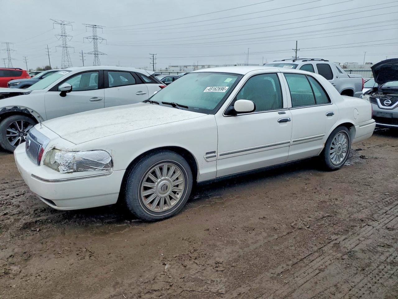 2010 Mercury Grand Marquis LS, VIN 2MEBM7FV6AX630115 — Normal wear