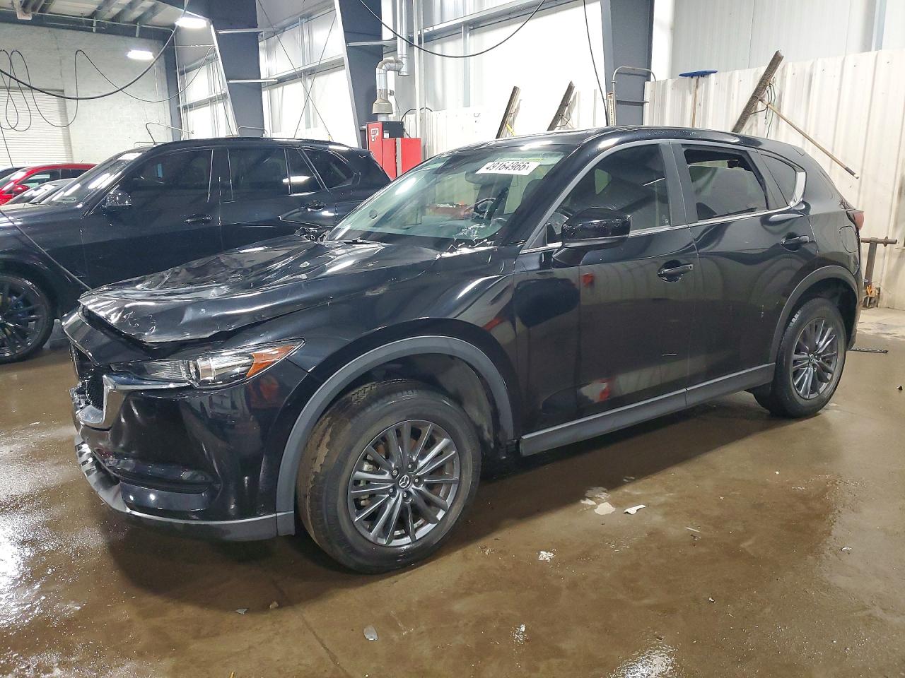 2021 Mazda CX-5 Touring, VIN JM3KFACMXM1394822 — Auction photo