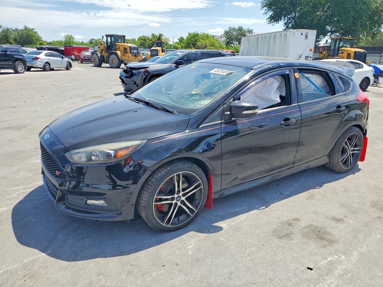 2016 Ford Focus ST, VIN 1FADP3L93GL389935 — Side