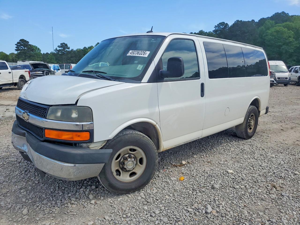 2013 Chevrolet Express Passenger 1LT, VIN 1GAWGRFA6D1114958 — Front end