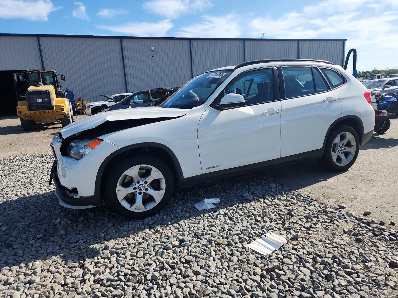 2015 BMW X1 sDrive28i, VIN WBAVM1C5XFVZ94494 — Front end