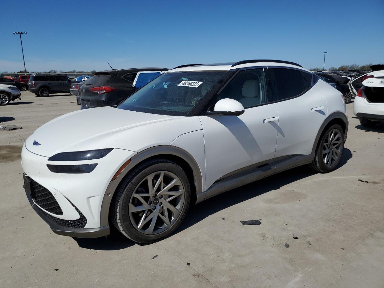 2023 Genesis GV60 Advanced, VIN KMUKCDTC0PU015479 — Undercarriage