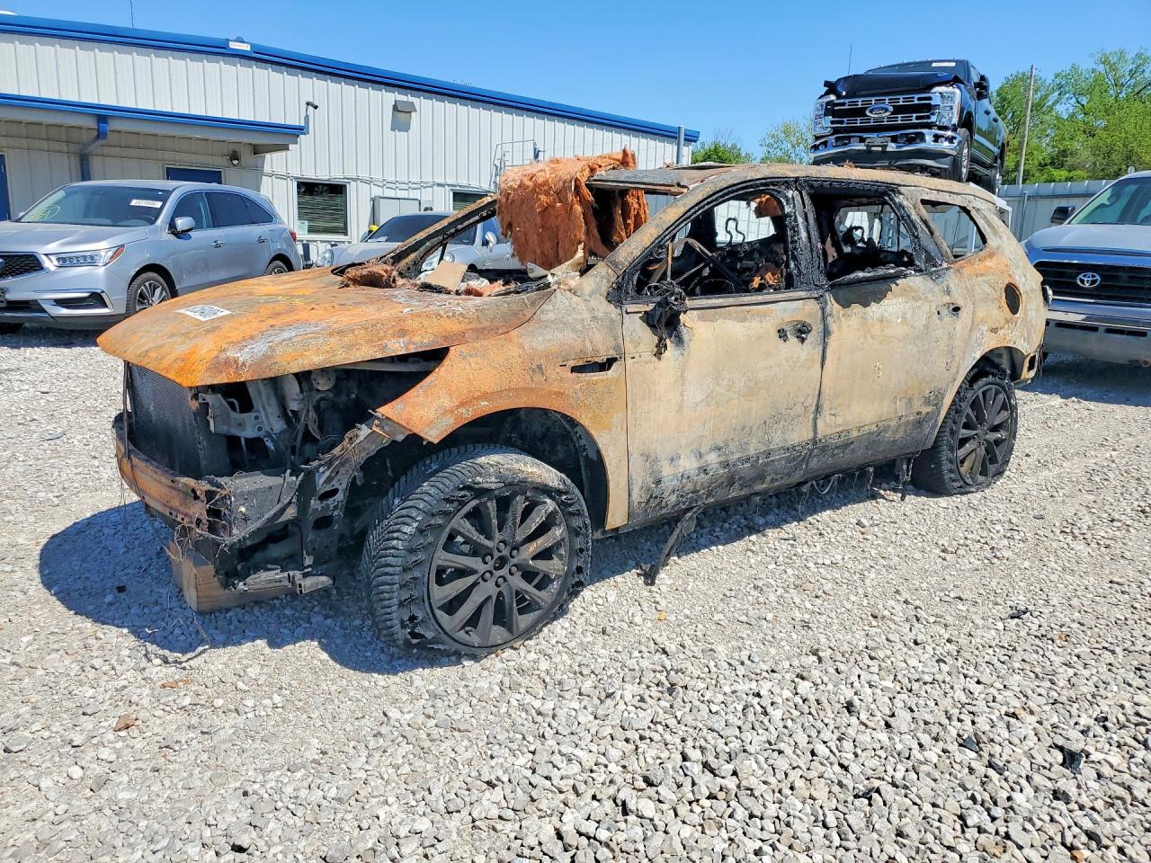 2021 Buick Enclave Premium, VIN 5GAEVBKW2MJ157972 — Burn