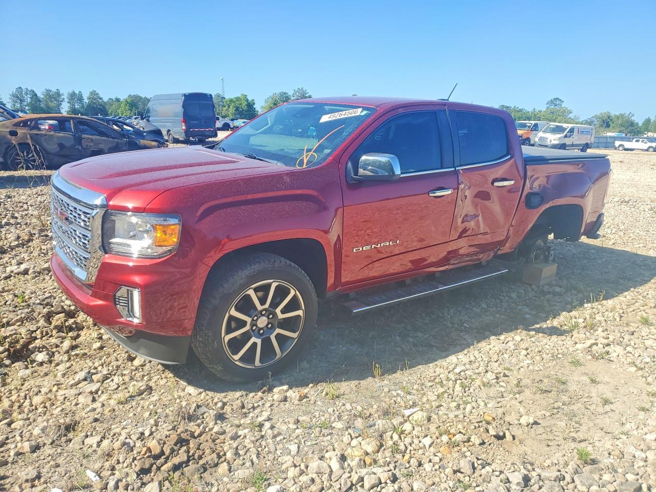2022 GMC Canyon 4WD Denali, VIN 1GTG6EENXN1103667 — Side
