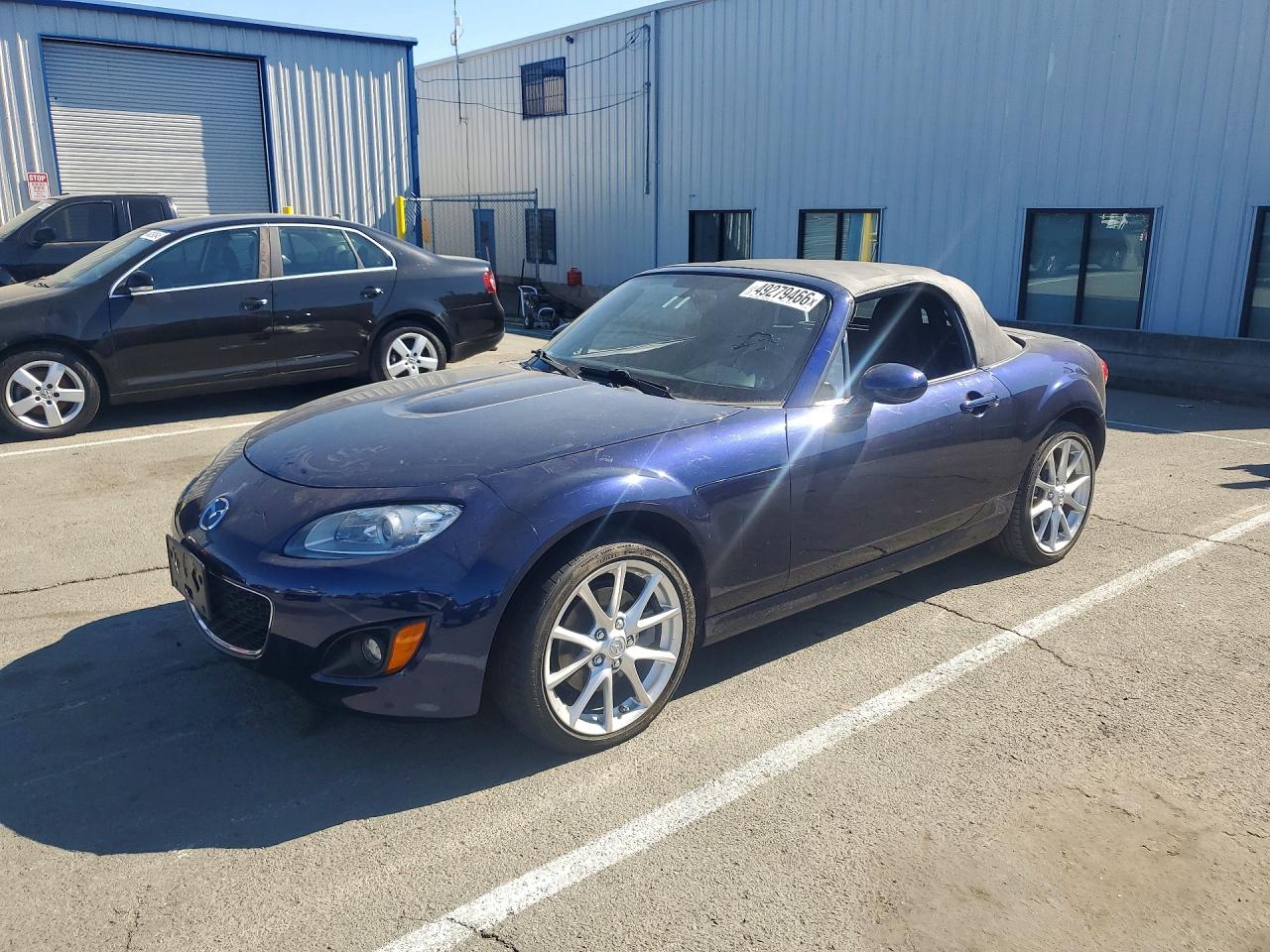2009 Mazda MX-5 Miata Touring, VIN JM1NC25F190201666 — Minor dents and scratches