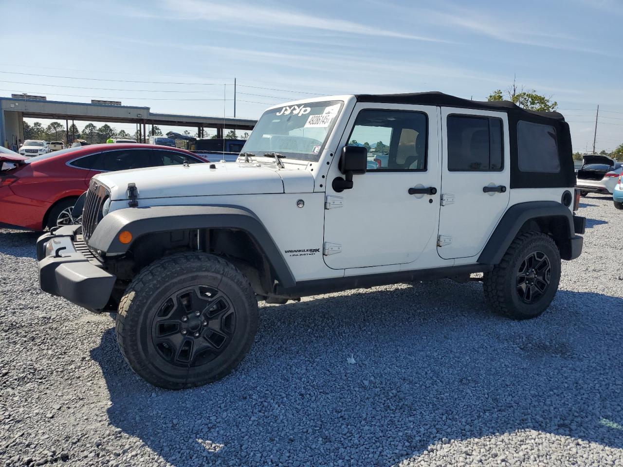 2018 Jeep Wrangler Unlimited Sport S, VIN 1C4BJWDG1JL924818 — Side