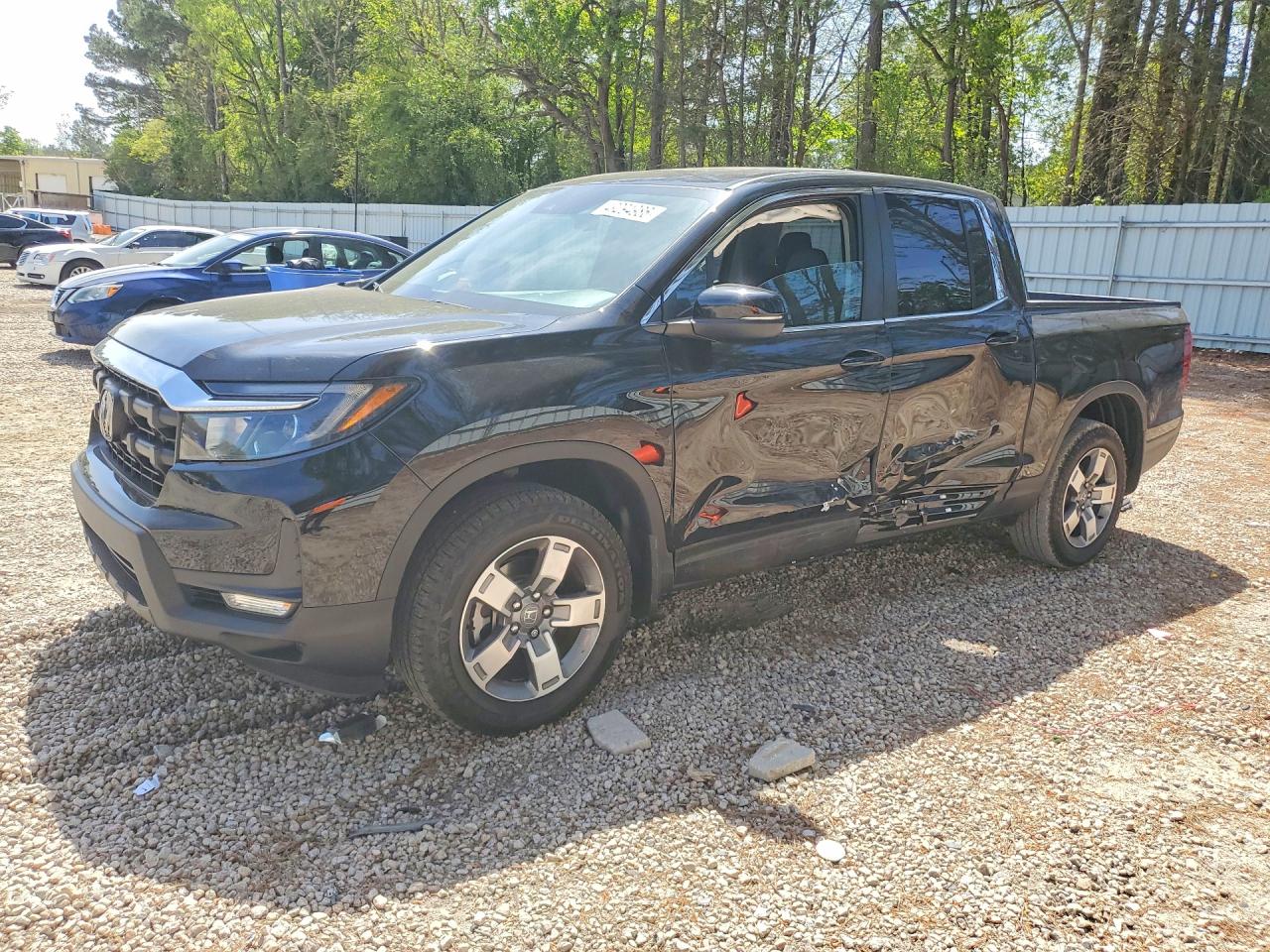 2026 Honda Ridgeline RTL, VIN 5FPYK3F54TB005281 — Side