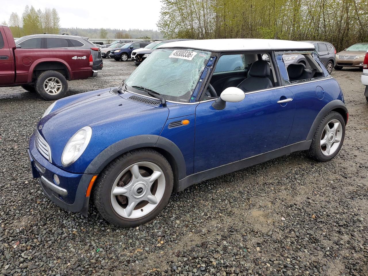 2002 MINI Hardtop, VIN WMWRC33462TC32585 — Бок