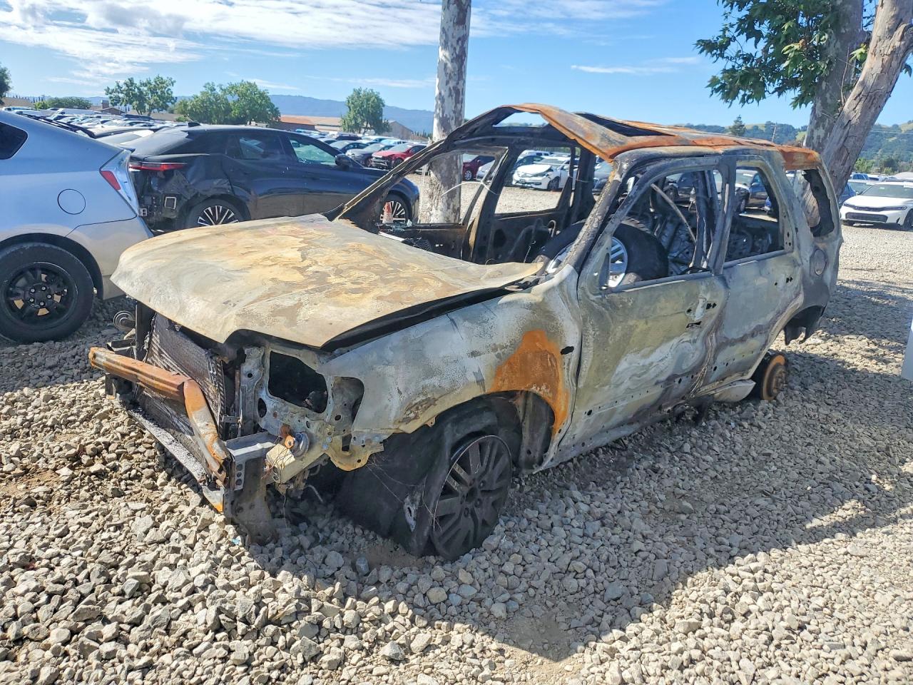 2006 Mercury Mariner Luxury, VIN 4M2CU57176DJ05532 — Burn