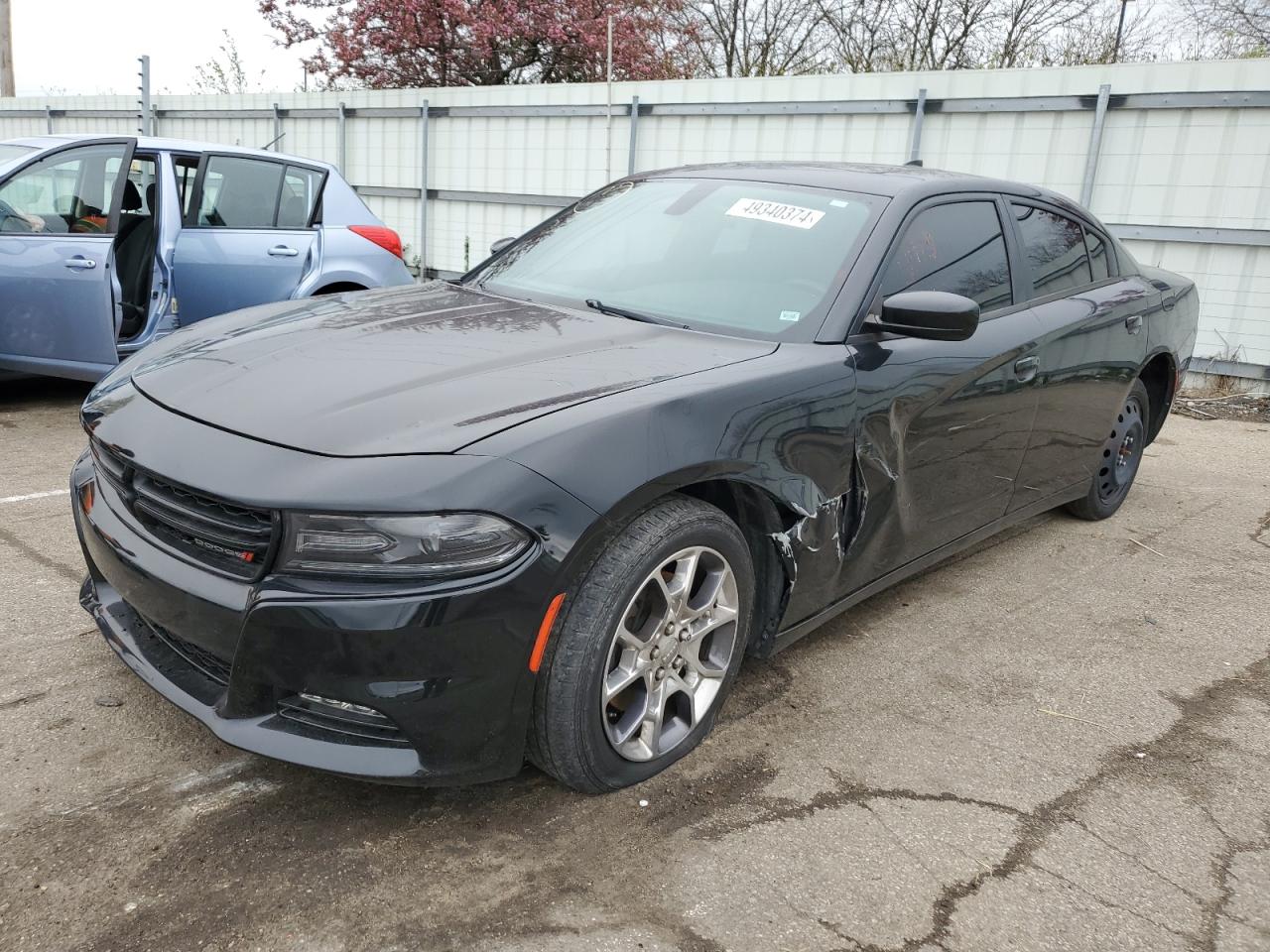 2015 Dodge Charger SXT, VIN 2C3CDXJG3FH919988 — Side