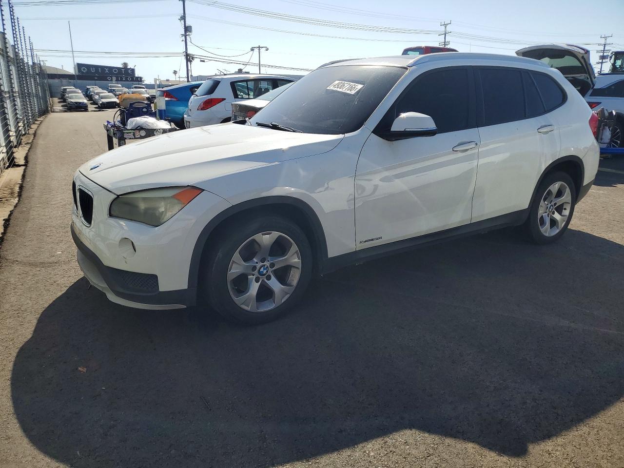 2015 BMW X1 sDrive28i, VIN WBAVM1C54FVW56833 — Minor dents and scratches