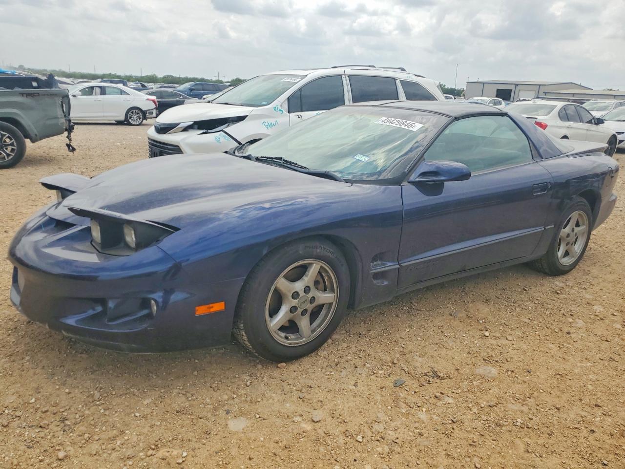 1999 Pontiac Firebird Firebird, VIN 2G2FS22K2X2232076 — Side