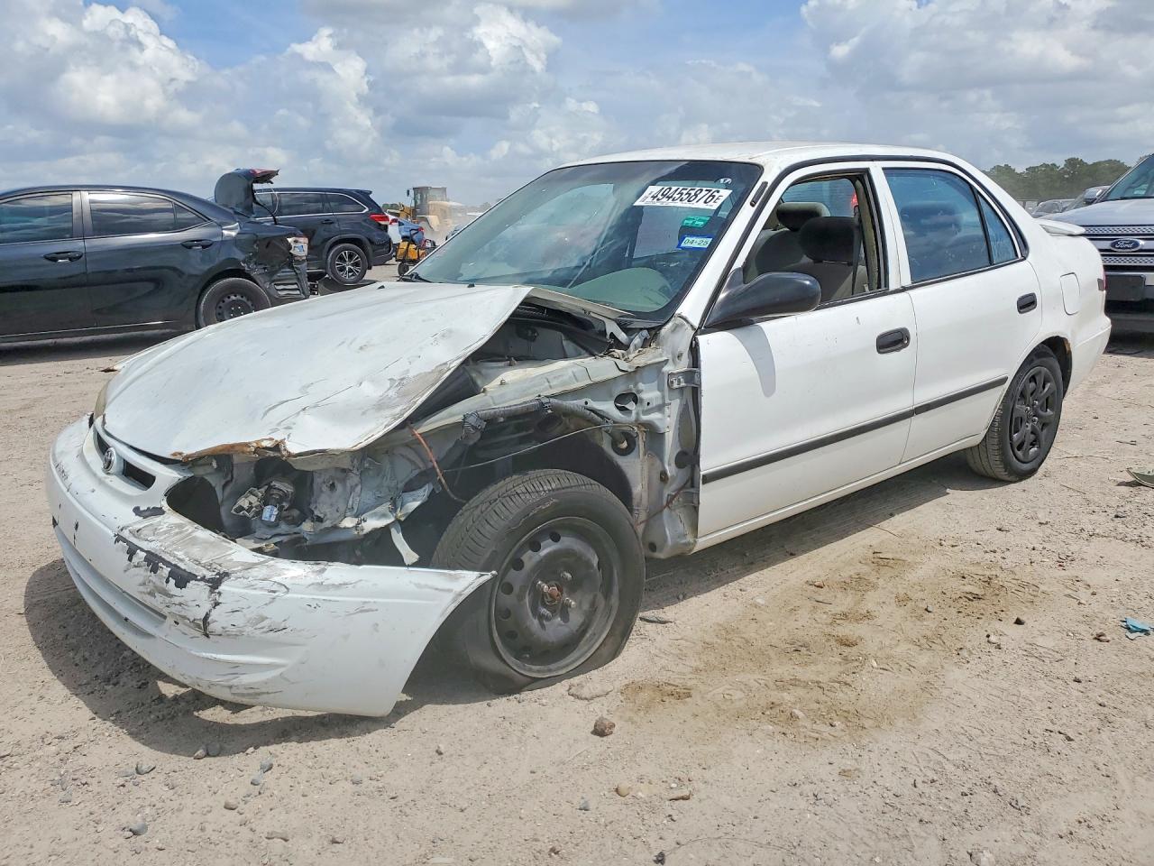 2000 Toyota Corolla CE, VIN 1NXBR12E0YZ330640 — Front end