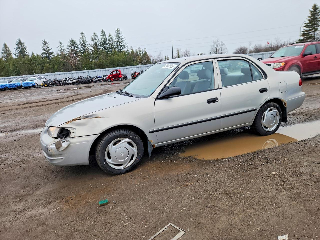 2000 Toyota Corolla CE, VIN 2T1BR12E0YC796571 — Front end