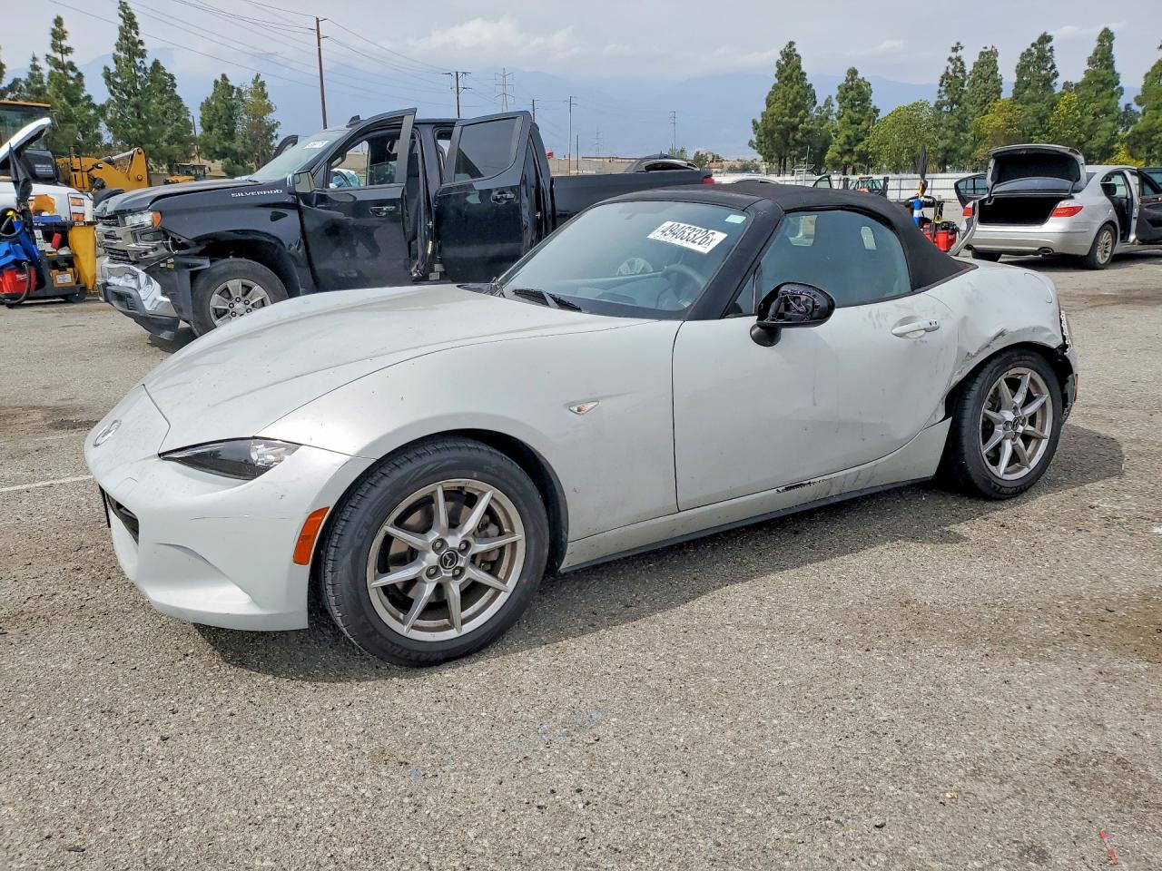 2016 Mazda MX-5 Miata Sport, VIN JM1NDAB74G0109243 — Side