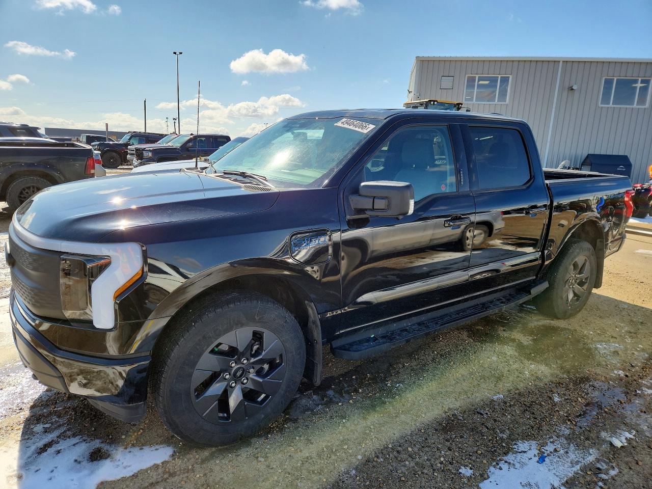 2024 Ford F-150 Lightning Flash, VIN 1FT6W3L77RWG18574 — Side