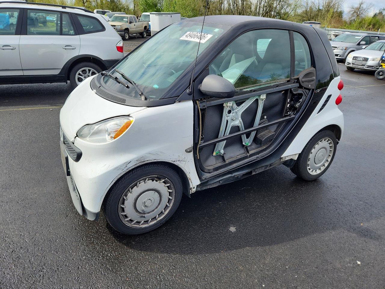 2013 Smart fortwo Pure, VIN WMEEJ3BA9DK680406 — Side