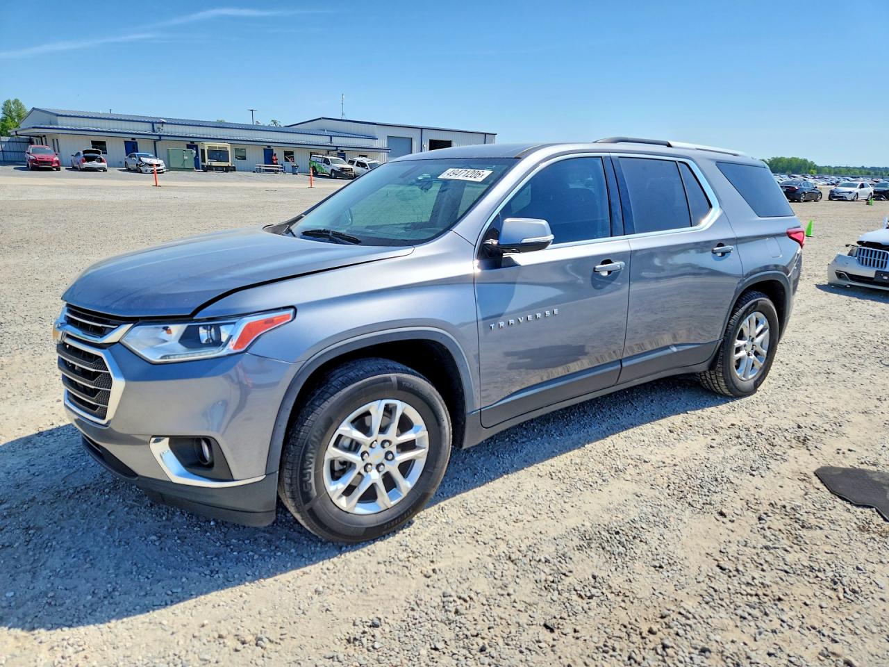 2018 Chevrolet Traverse LT Cloth, VIN 1GNERGKW7JJ154911 — Side