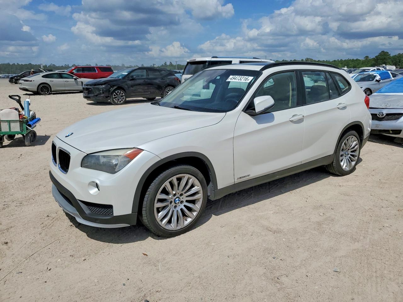 2015 BMW X1 xDrive28i, VIN WBAVL1C5XFVY35364 — Minor dents and scratches