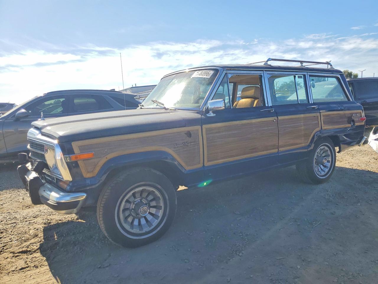 1987 Jeep Grand Wagoneer, VIN 1JCNJ15U5HT000489 — Фото с аукциона