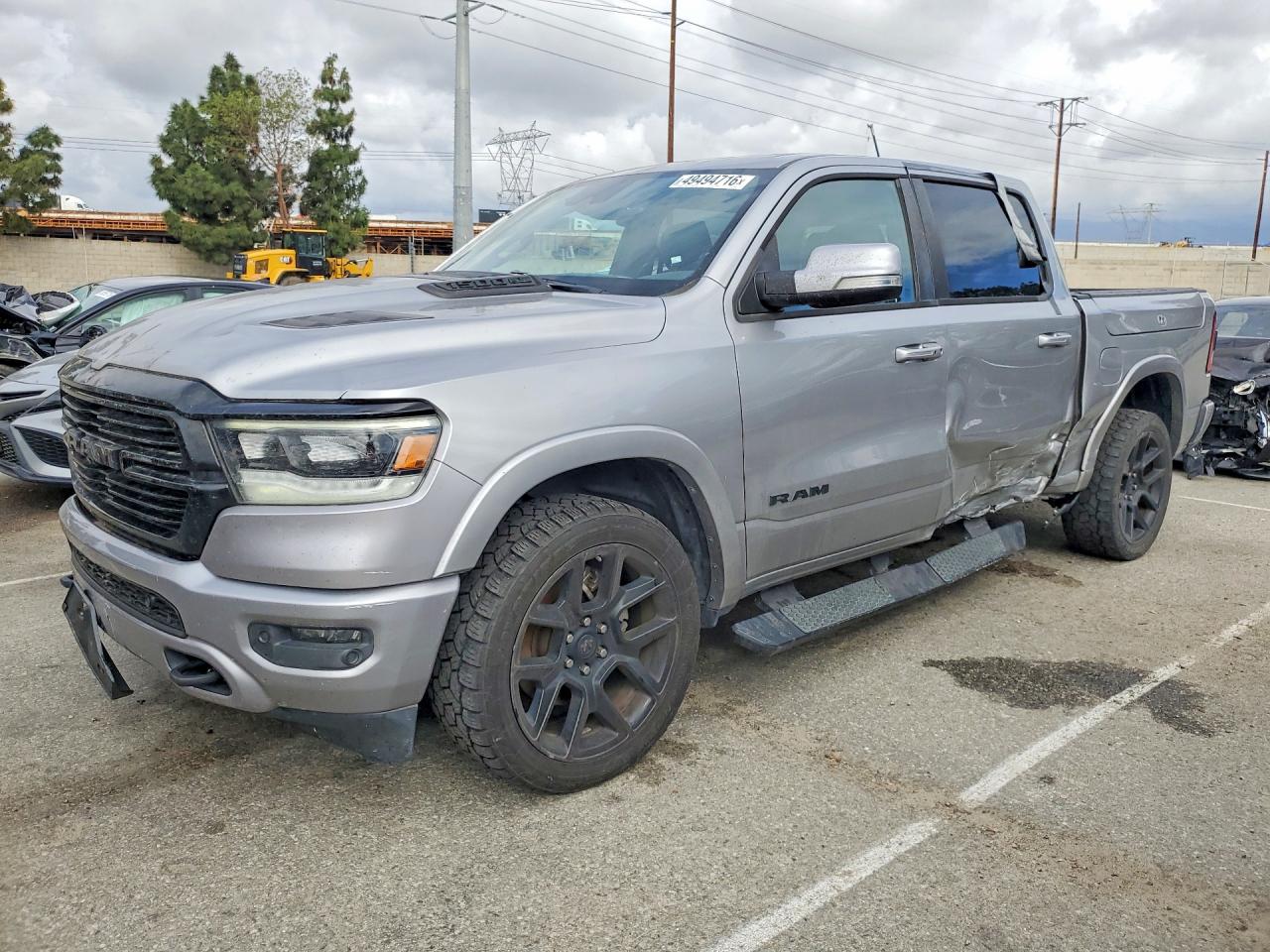 2020 Ram 1500 Laramie, VIN 1C6SRFJT4LN221660 — Side
