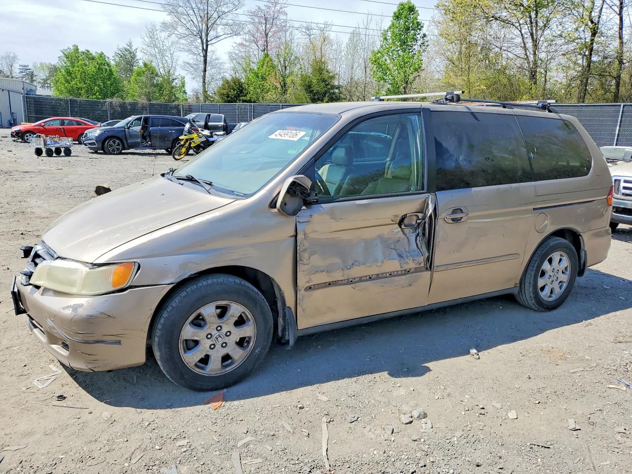 2004 Honda Odyssey EX-L, VIN 5FNRL18994B090800 — Бок