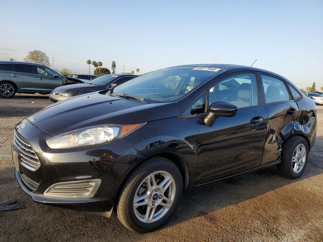 2017 Ford Fiesta SE, VIN 3FADP4BJ0HM132944 — Side