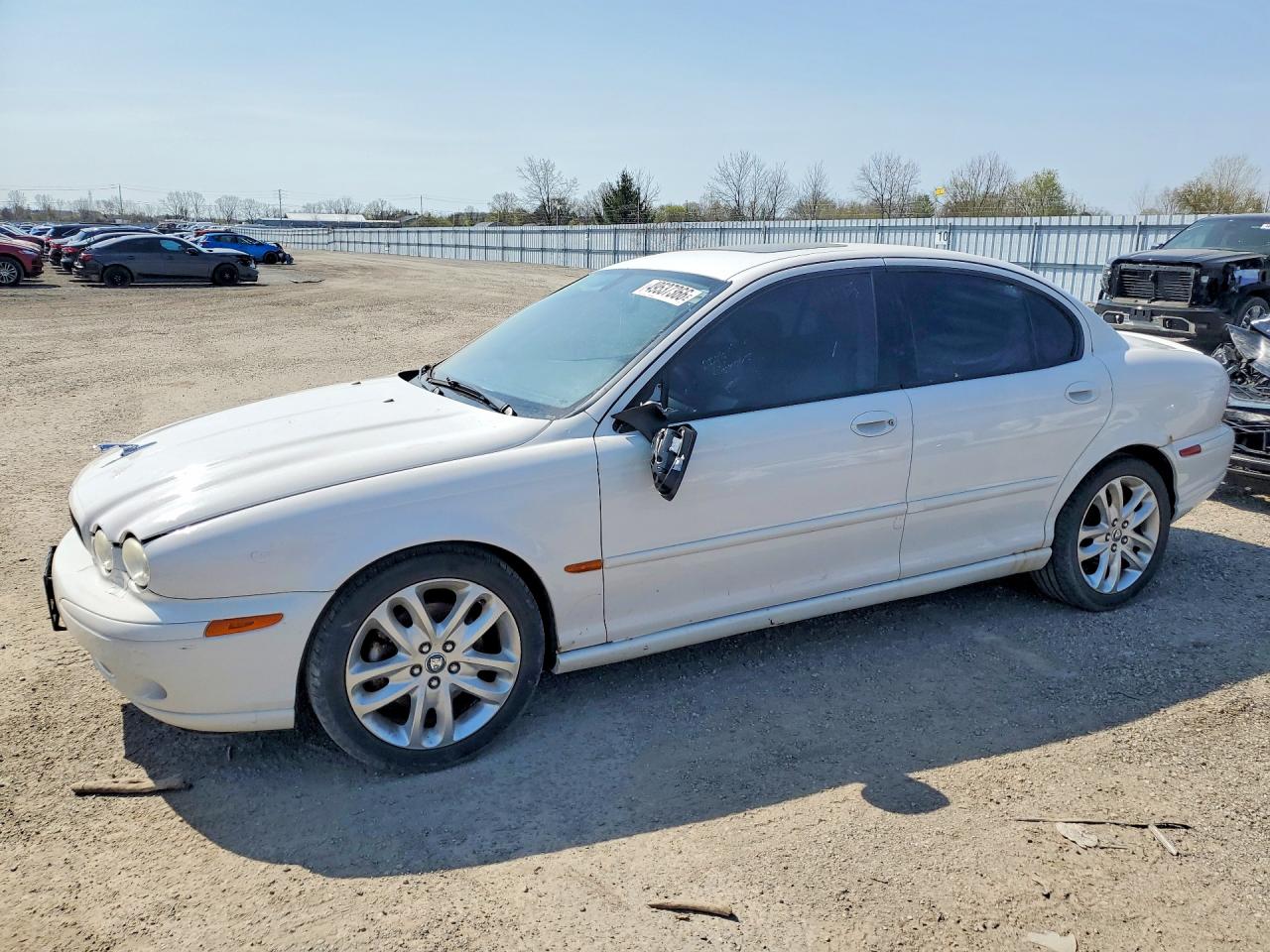 2003 Jaguar X-Type, VIN SAJGA53D43XD19201 — Бок