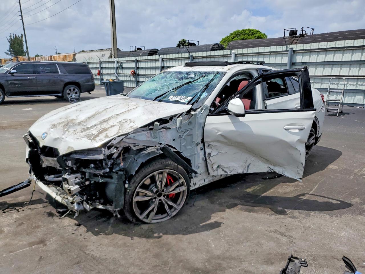 2021 BMW X6 M50i, VIN 5UXCY8C02M9F23278 — Rollover