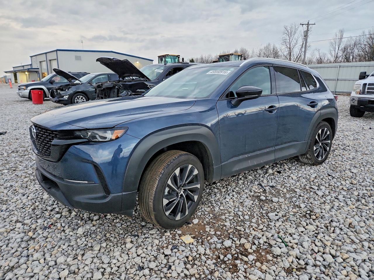 2026 Mazda CX-50 Hybrid Premium Plus, VIN 7MMVAAEW8TN147907 — Side