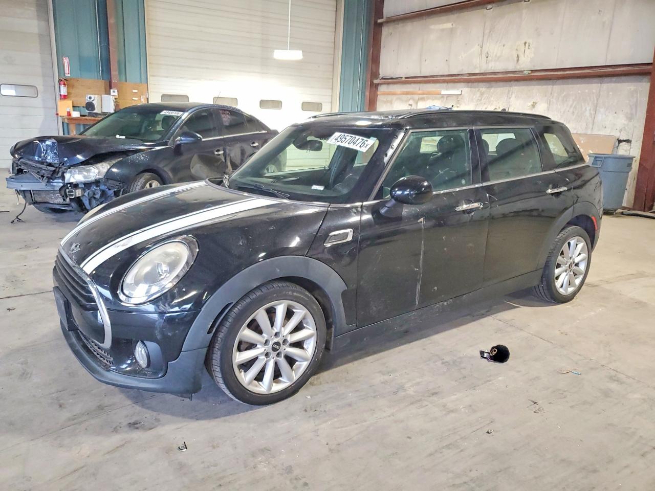 2016 MINI Clubman, VIN WMWLN5C58G2E31168 — Hail