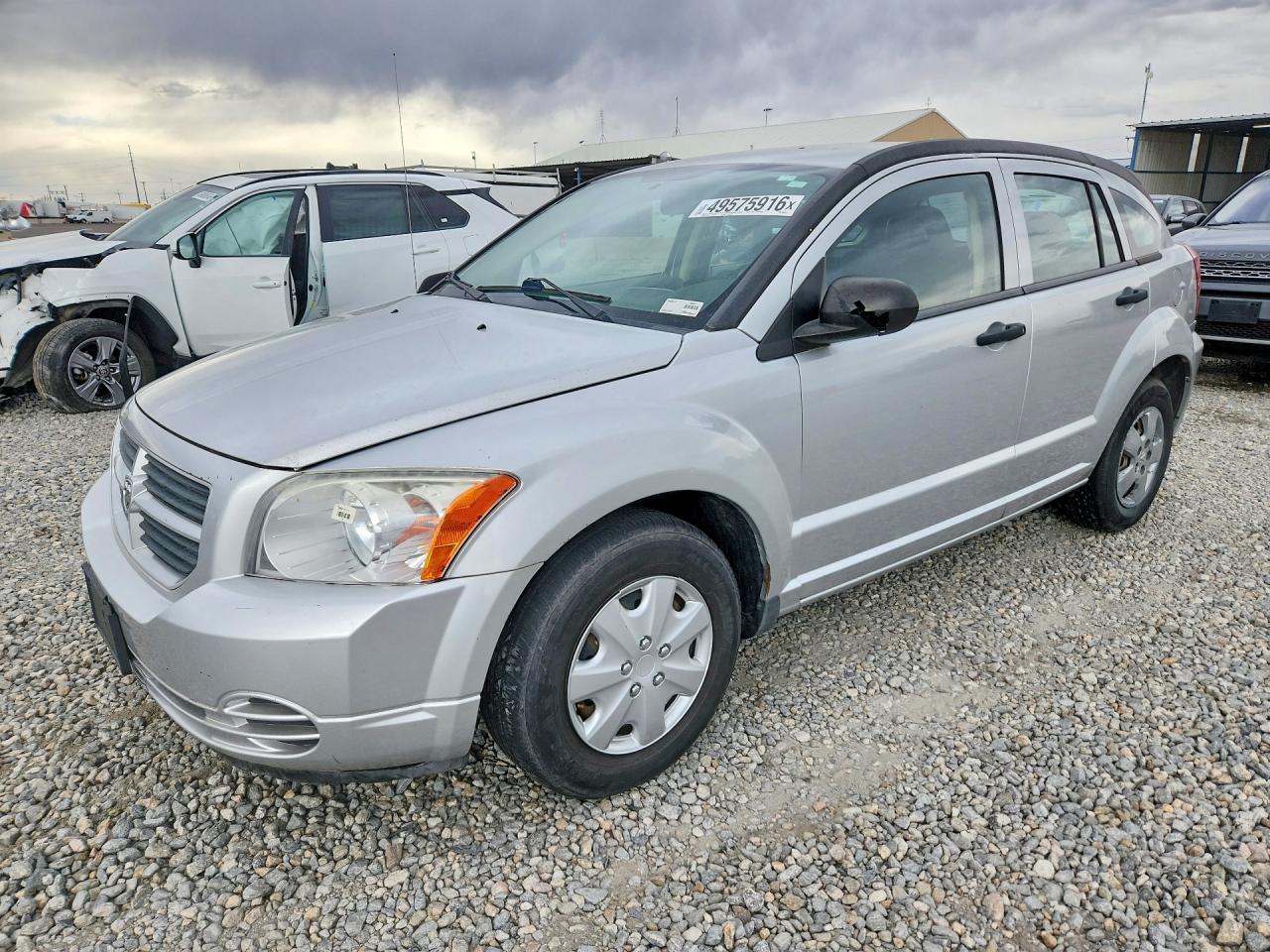 2008 Dodge Caliber SE, VIN 1B3HB28B58D699355 — Бок