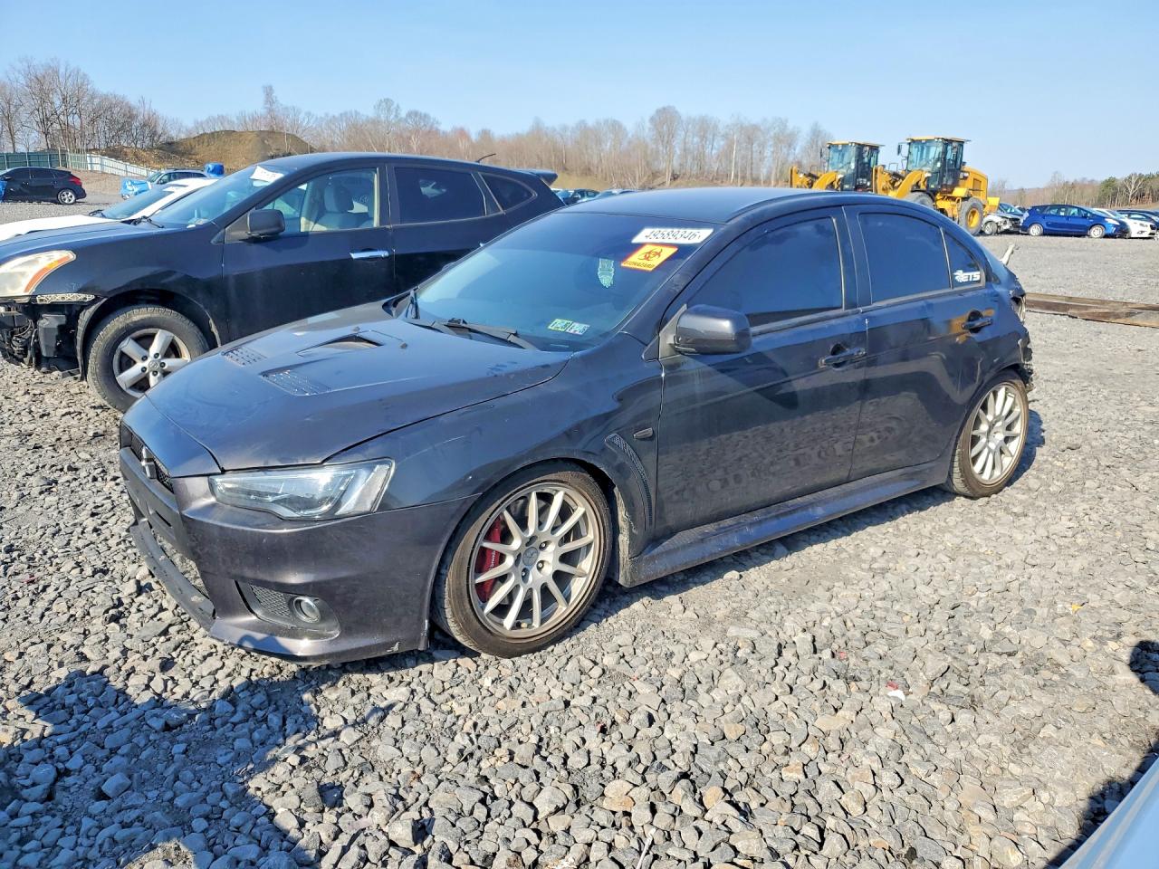 2014 Mitsubishi Lancer Evolution GSR, VIN JA32W8FV8EU005941 — Rear end