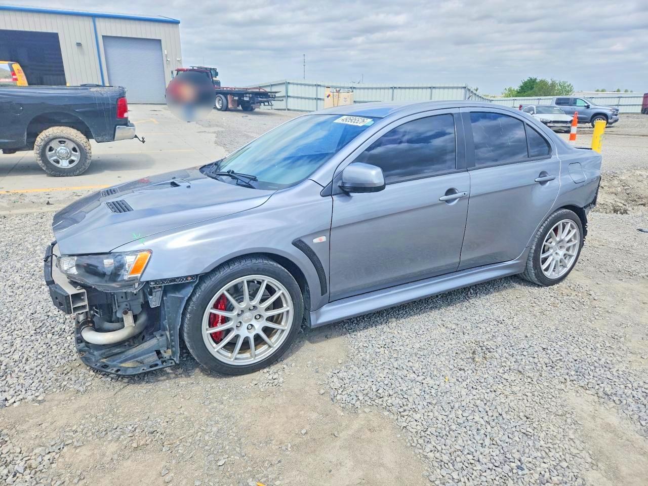 2013 Mitsubishi Lancer Evolution GSR, VIN JA32W8FV2DU005139 — Rear end