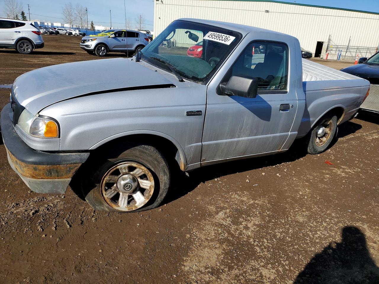 2009 Mazda B-Series, VIN 4F4YR12D29PM02242 — Бок