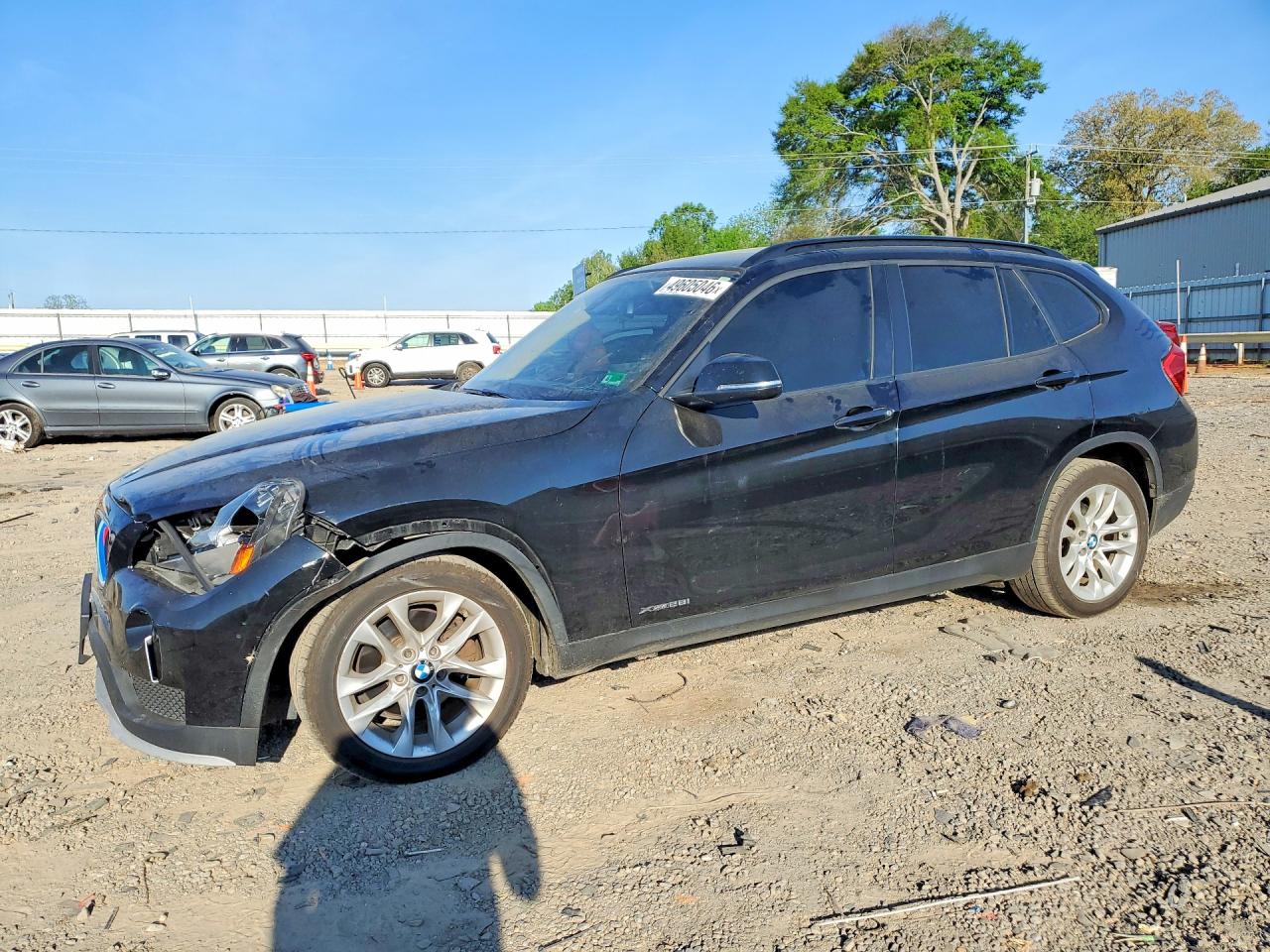2015 BMW X1 xDrive28i, VIN WBAVL1C59FVY41107 — Front end