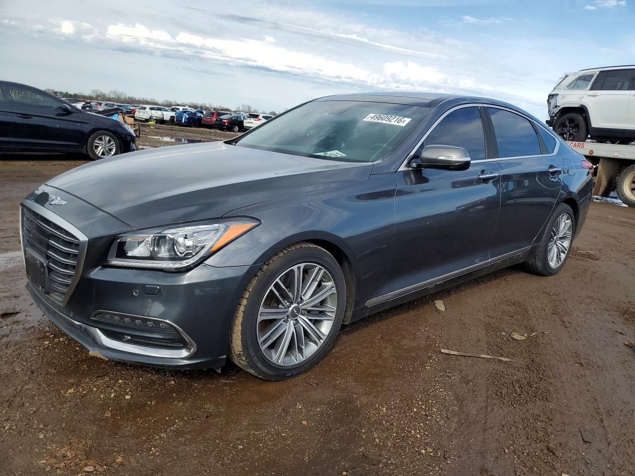 2018 Genesis G80 3.8L, VIN KMHGN4JE2JU237306 — Undercarriage