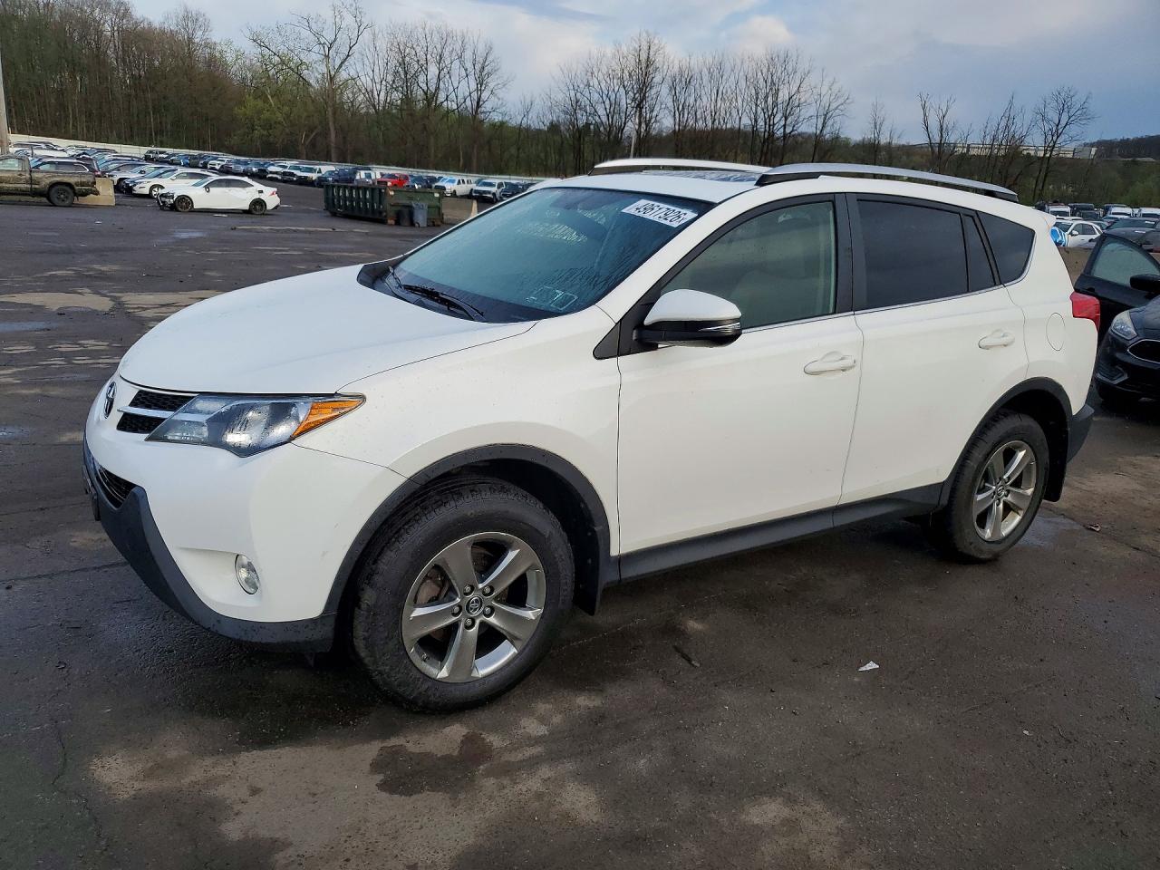 2015 Toyota RAV4 XLE, VIN JTMRFREVXFJ036313 — Normal wear