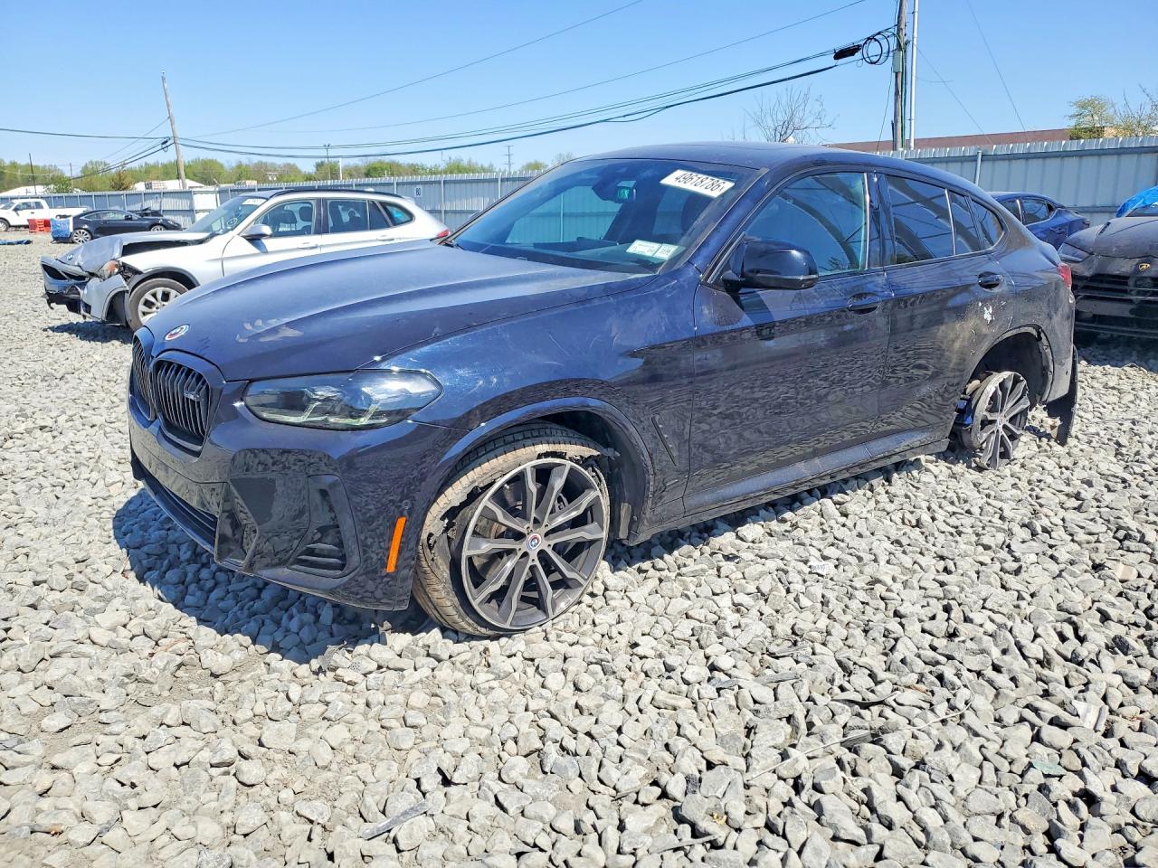 2023 BMW X4 M40i, VIN 5UX43DT03P9P44367 — Side