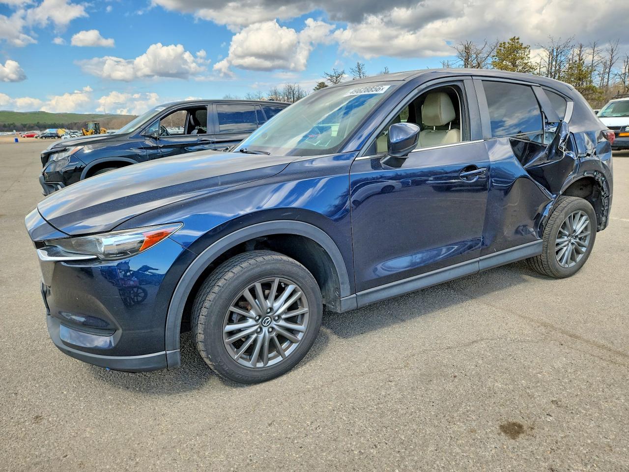 2017 Mazda CX-5 Touring, VIN JM3KFBCL9H0184639 — Side