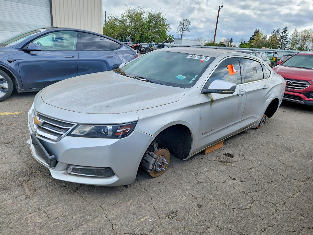 2016 Chevrolet Impala LT, VIN 2G1115S3XG9122766 — Side