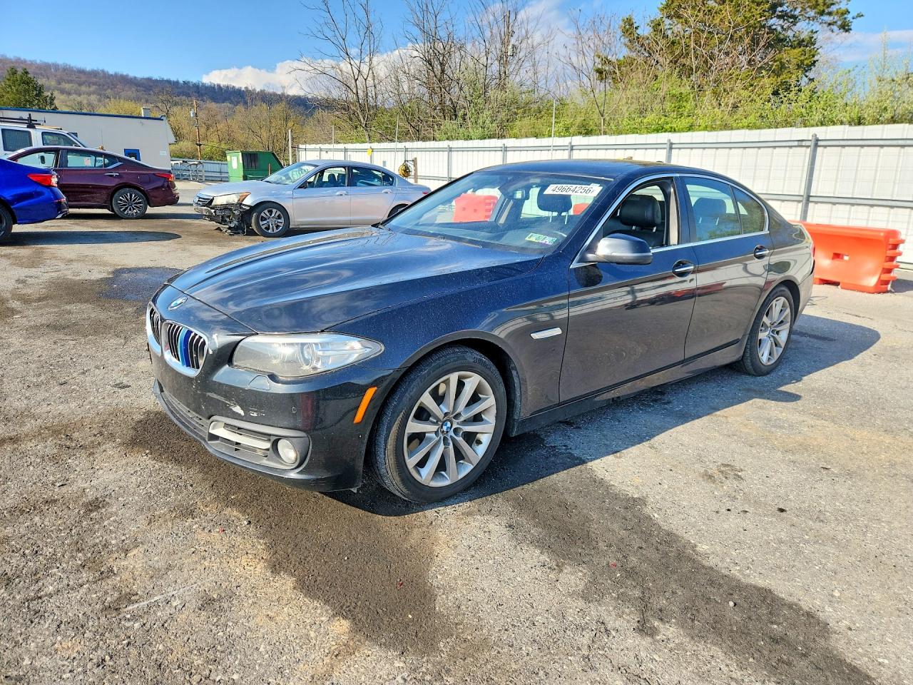 2016 BMW 5 Series 535i xDrive, VIN WBA5B3C53GG252879 — Side