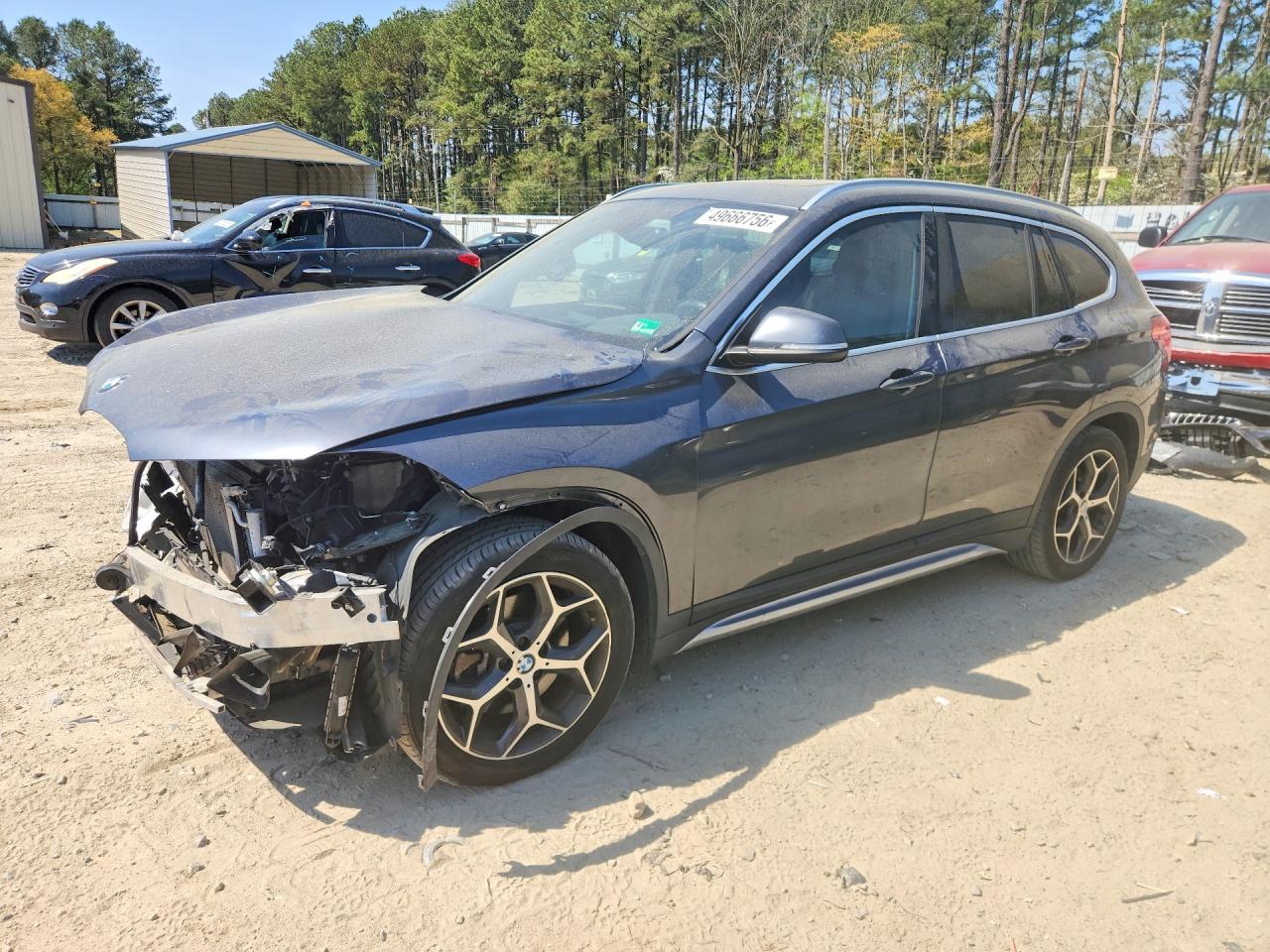 2018 BMW X1 xDrive28i, VIN WBXHT3C34J5L33343 — Front end
