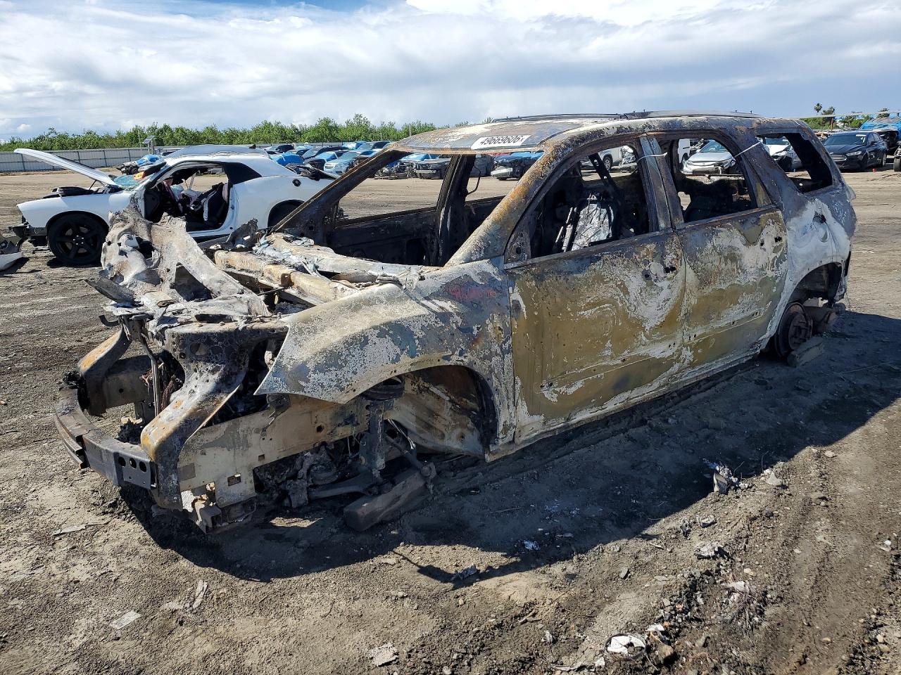 2011 GMC Acadia SLT2, VIN 1GKKRSED9BJ371083 — Vandalism