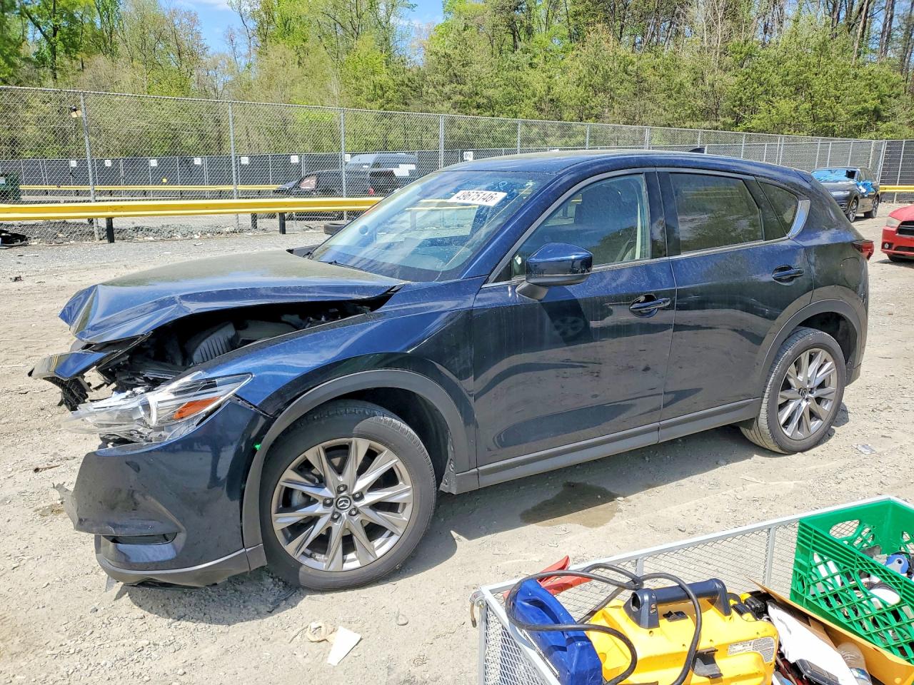 2021 Mazda CX-5 Grand Touring Reserve, VIN JM3KFBAY8M0466747 — Front end